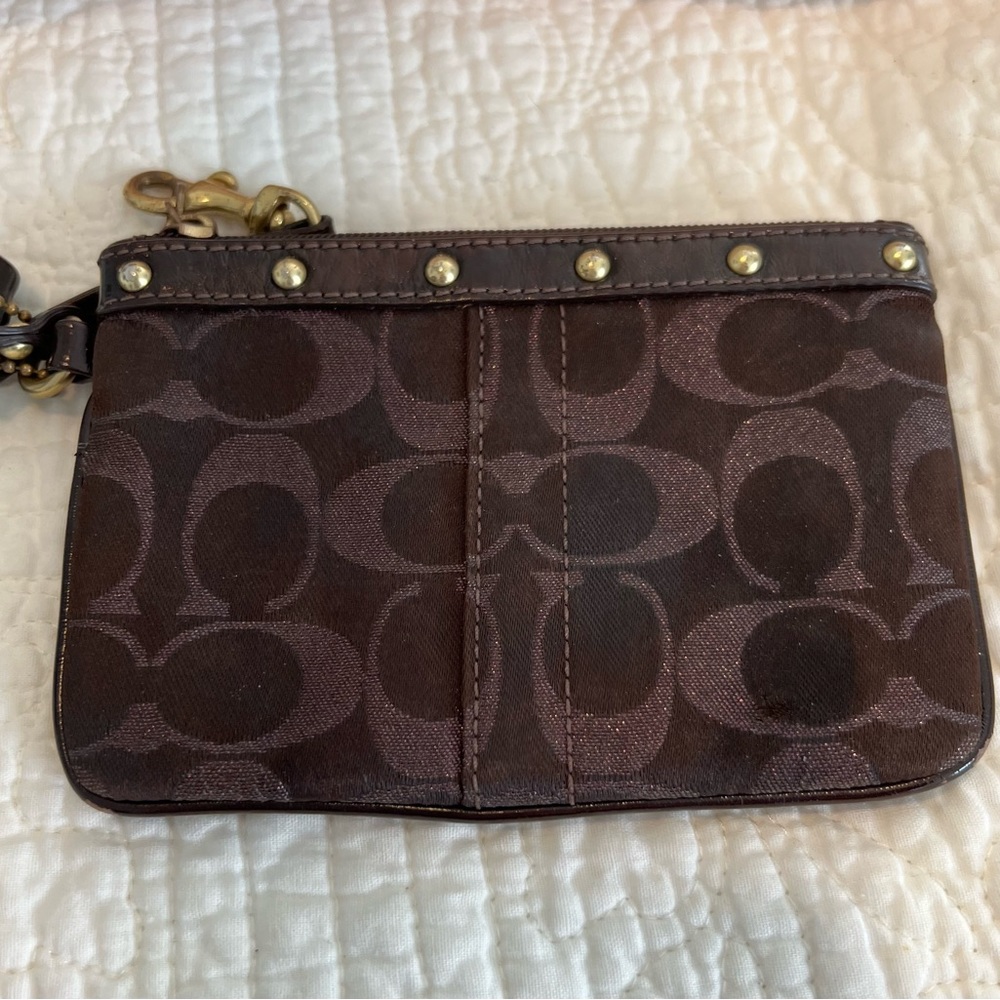 Coach signature studded wristlet